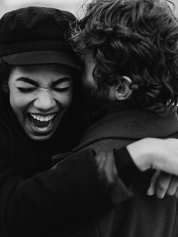 woman and man hugging