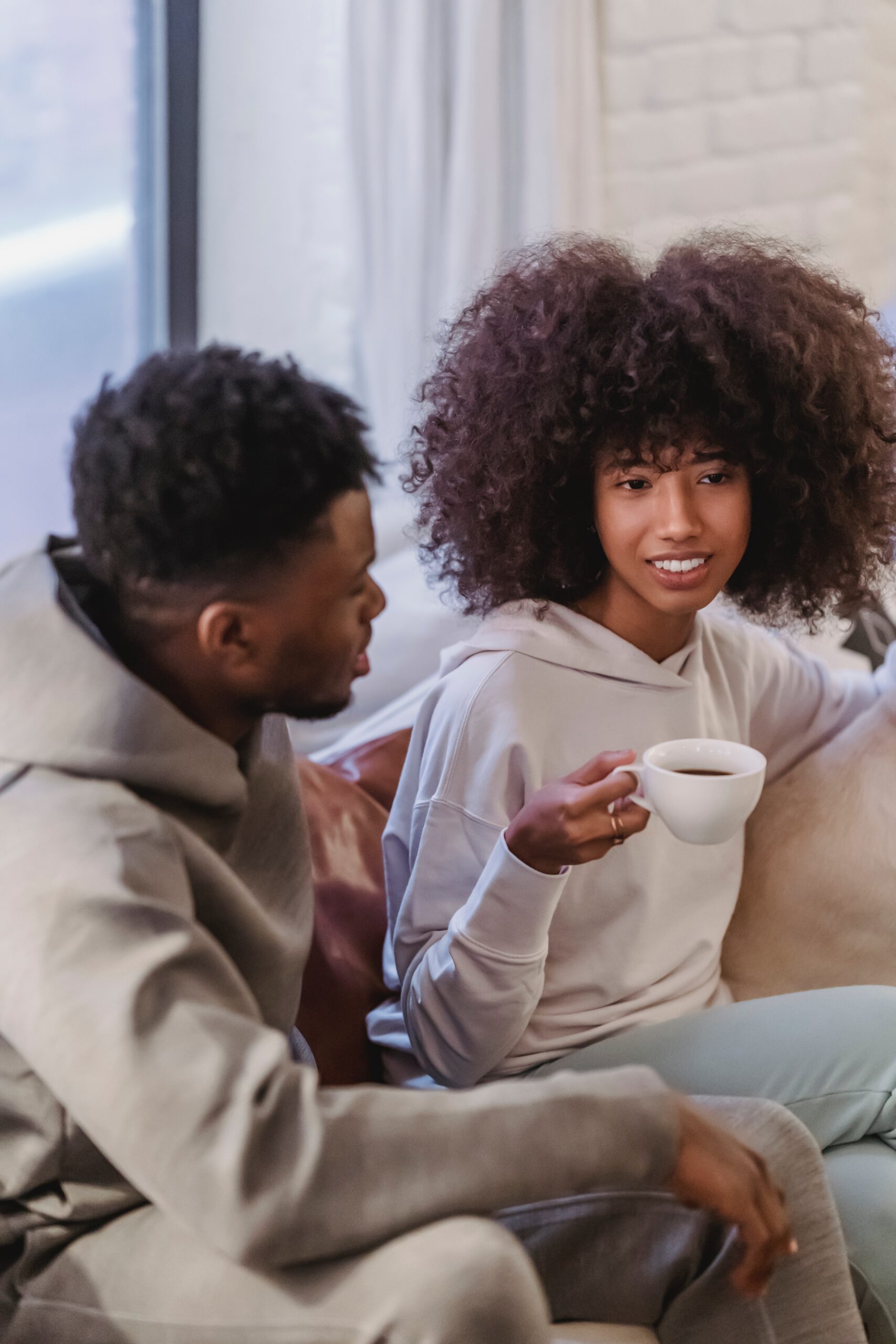 man explaining to woman in a therapy session