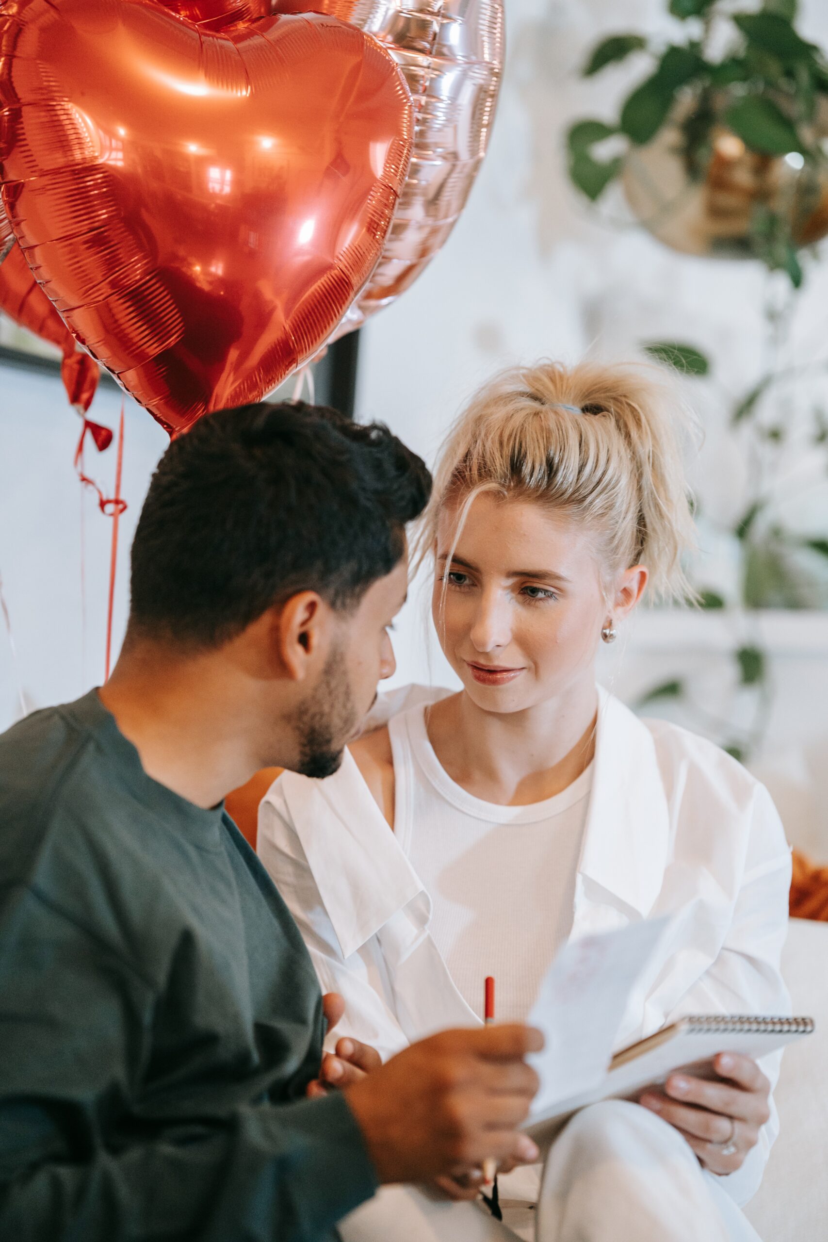 man explaining to woman in a therapy session
