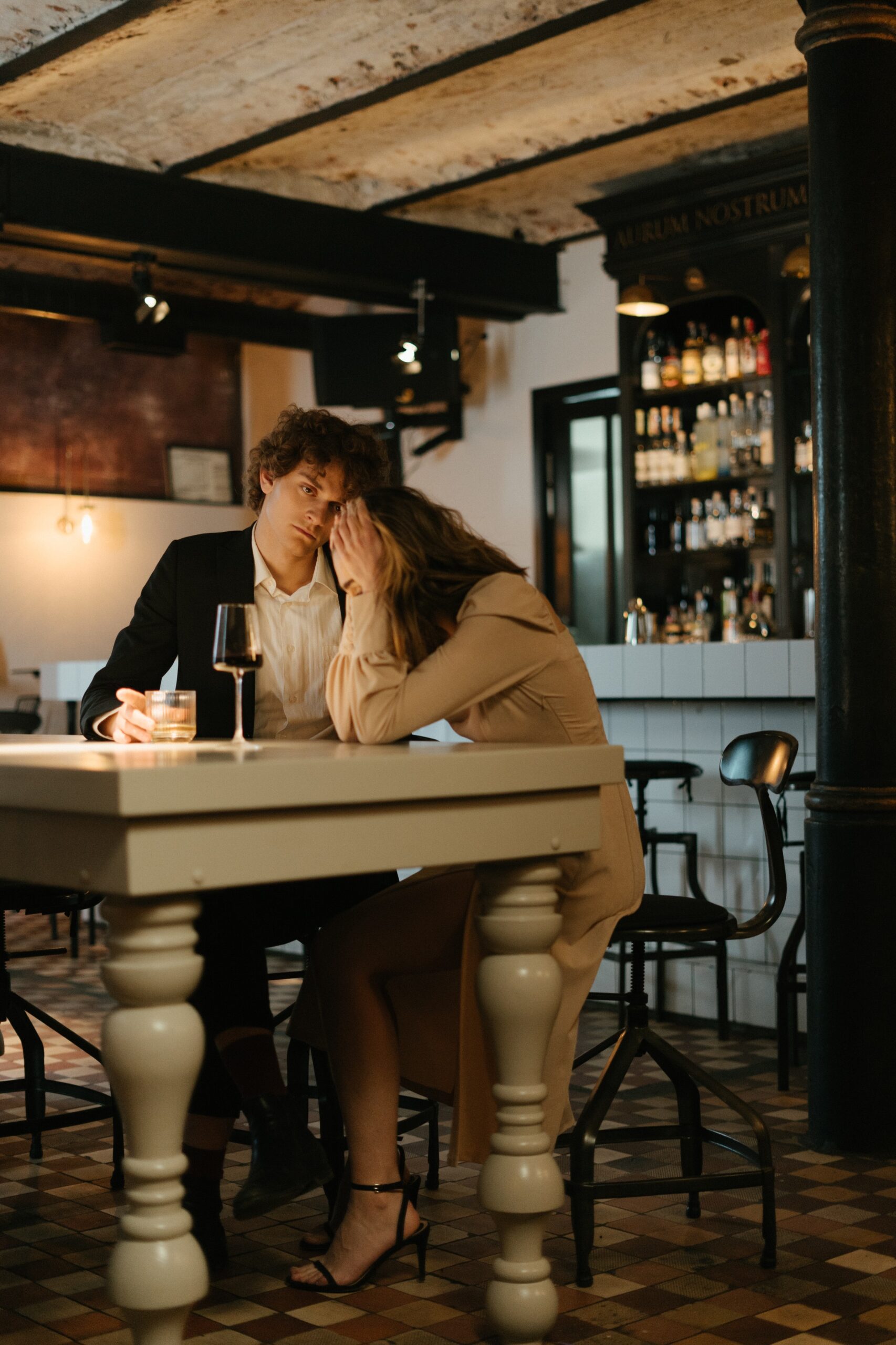 man explaining to woman in a therapy session