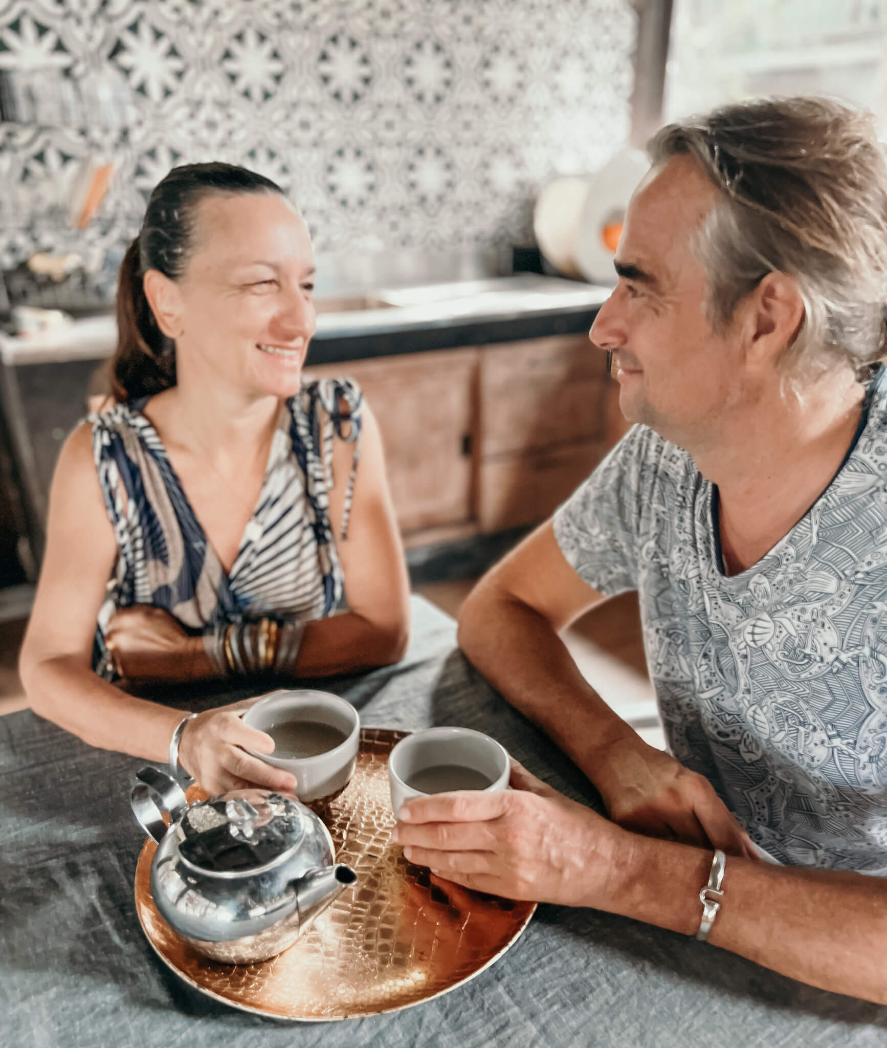 woman and men having tea