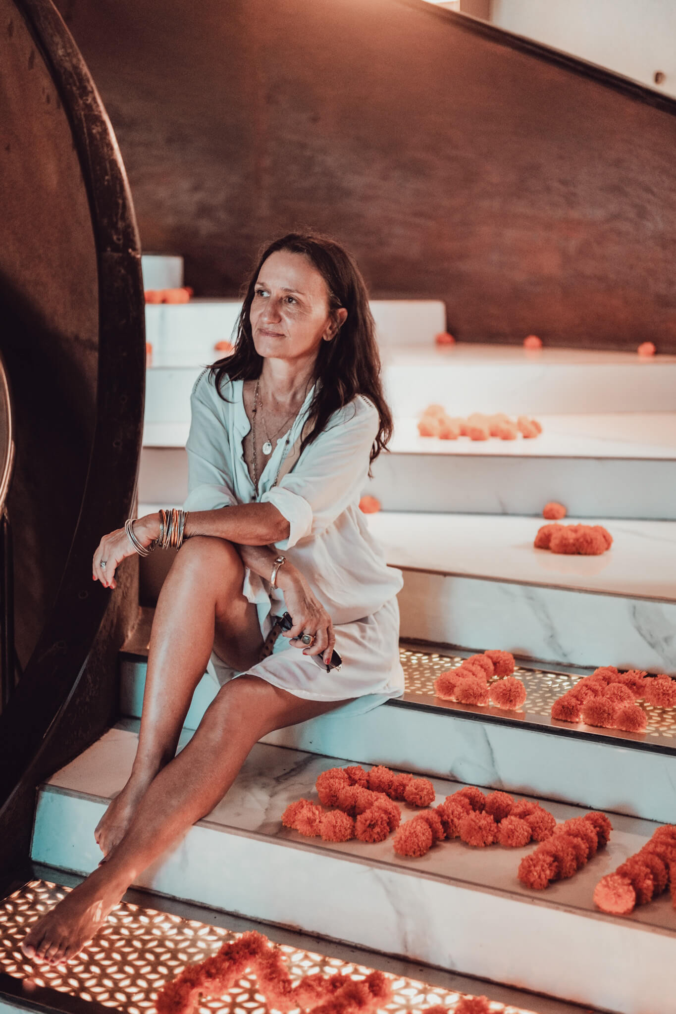 woman sitting on stairs